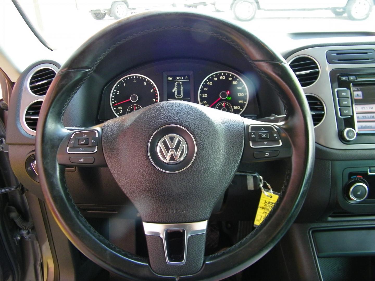 2011 Gray /Black Volkswagen Tiguan S (WVGAV7AX8BW) with an 2.0L L4 DOHC 16V TURBO engine, Automatic transmission, located at 4000 Bee Ridge Road, Sarasota, FL, 34233, (941) 926-0300, 27.298664, -82.489151 - Photo#19