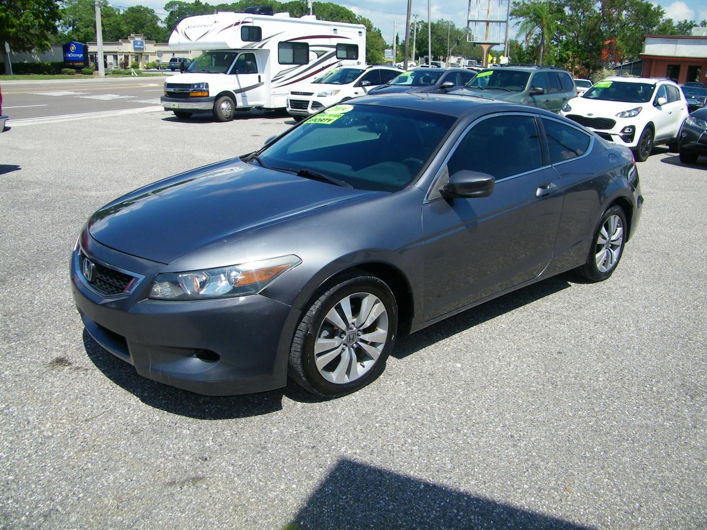 2009 Grey /Black Honda Accord EX-L Coupe AT (1HGCS12829A) with an 2.4L L4 DOHC 16V engine, 6-Speed Automatic transmission, located at 4000 Bee Ridge Road, Sarasota, FL, 34233, (941) 926-0300, 27.298664, -82.489151 - Photo#0