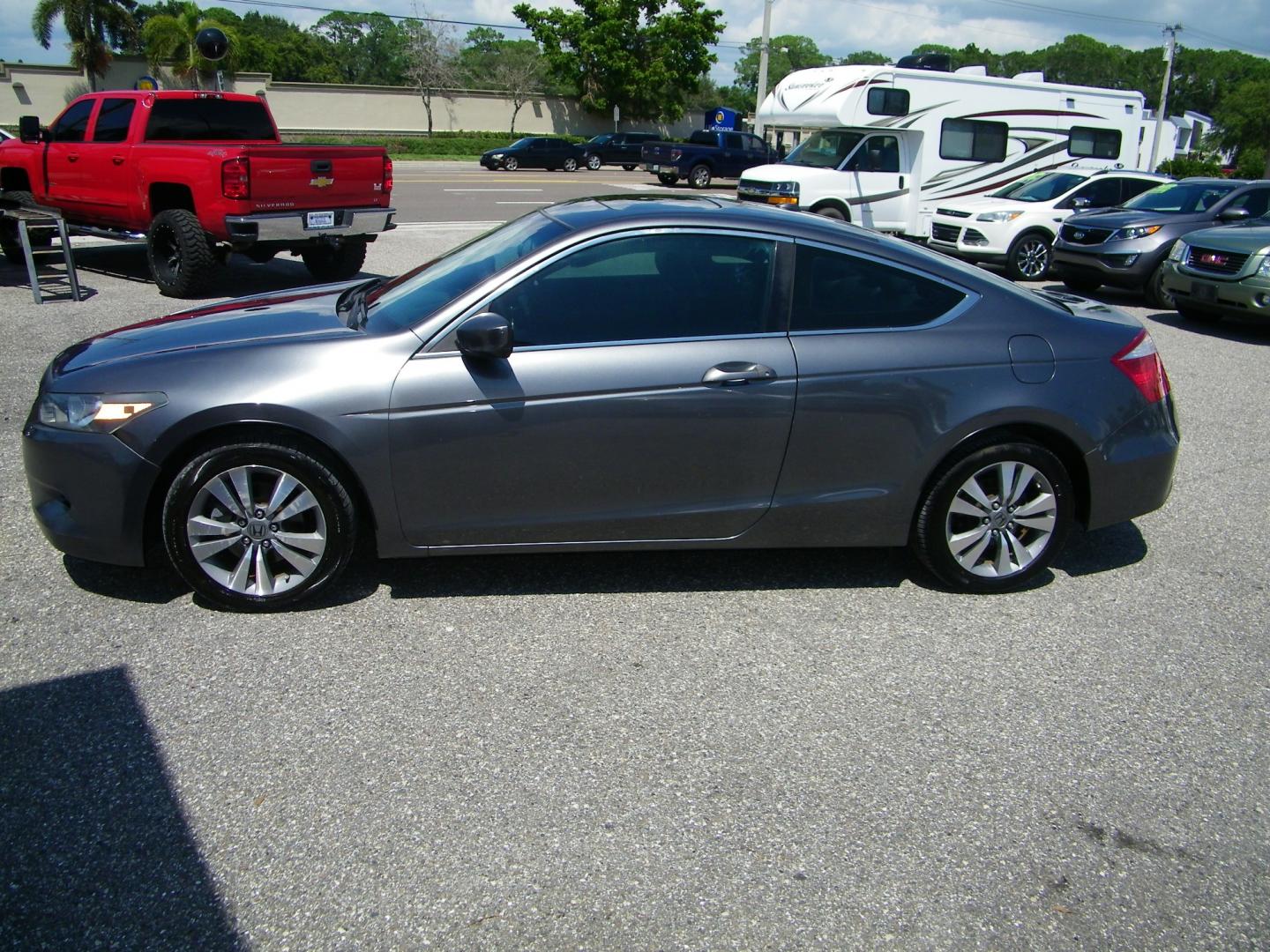 2009 Grey /Black Honda Accord EX-L Coupe AT (1HGCS12829A) with an 2.4L L4 DOHC 16V engine, 6-Speed Automatic transmission, located at 4000 Bee Ridge Road, Sarasota, FL, 34233, (941) 926-0300, 27.298664, -82.489151 - Photo#2