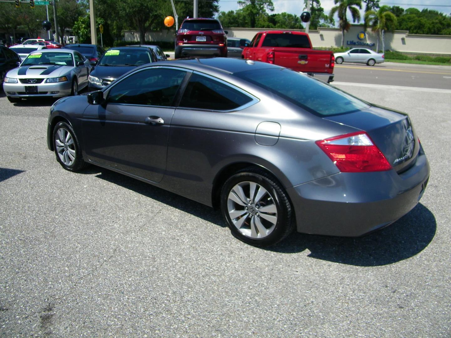 2009 Grey /Black Honda Accord EX-L Coupe AT (1HGCS12829A) with an 2.4L L4 DOHC 16V engine, 6-Speed Automatic transmission, located at 4000 Bee Ridge Road, Sarasota, FL, 34233, (941) 926-0300, 27.298664, -82.489151 - Photo#3