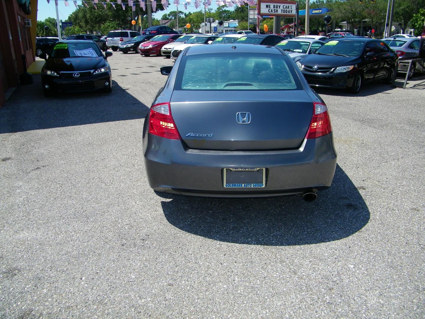 2009 Grey /Black Honda Accord EX-L Coupe AT (1HGCS12829A) with an 2.4L L4 DOHC 16V engine, 6-Speed Automatic transmission, located at 4000 Bee Ridge Road, Sarasota, FL, 34233, (941) 926-0300, 27.298664, -82.489151 - Photo#4