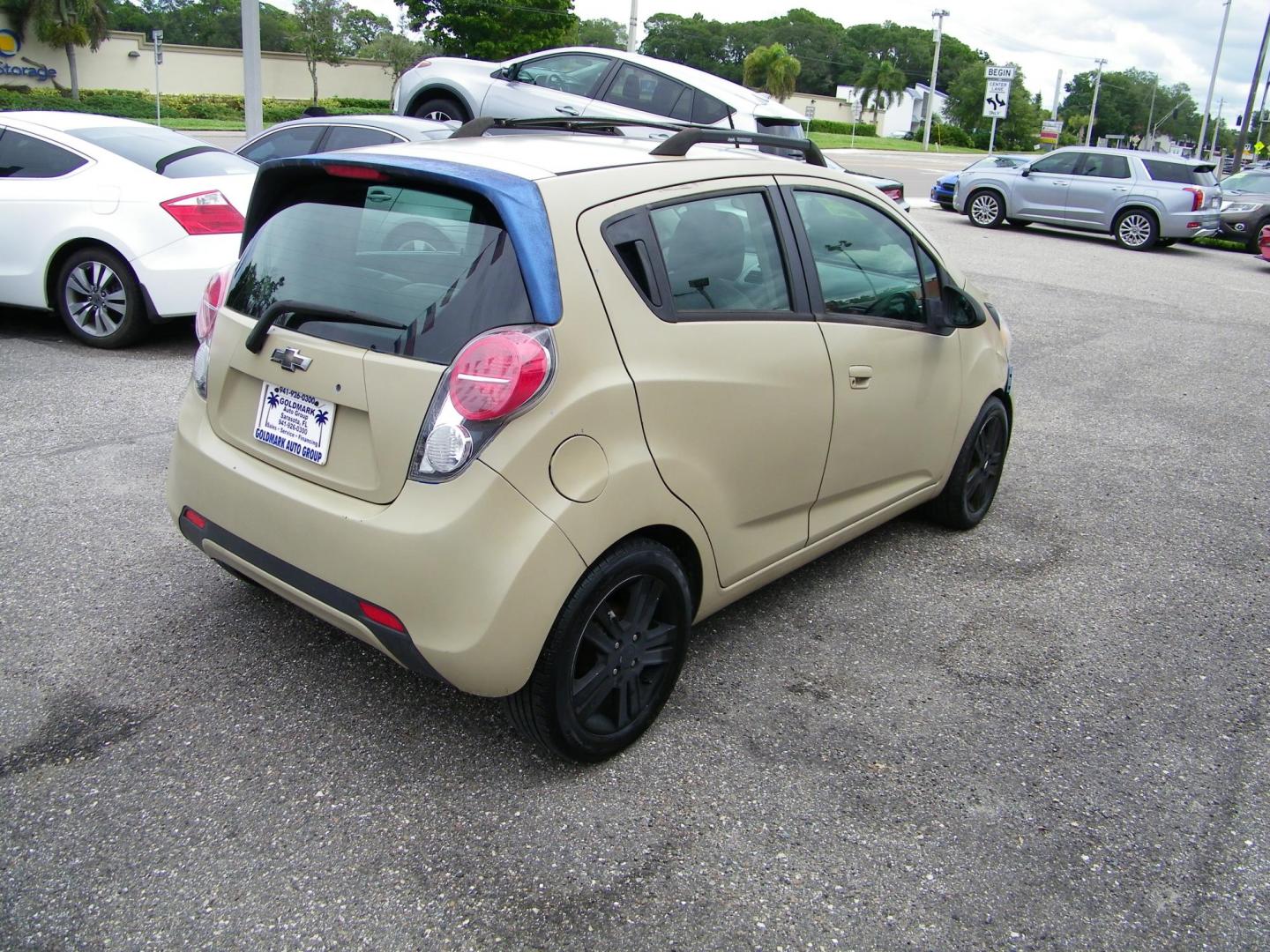 2014 Chevrolet Spark LS Manual (KL8CA6S91EC) with an 1.2L L4 16V DOHC engine, 5-Speed Manual transmission, located at 4000 Bee Ridge Road, Sarasota, FL, 34233, (941) 926-0300, 27.298664, -82.489151 - Photo#5