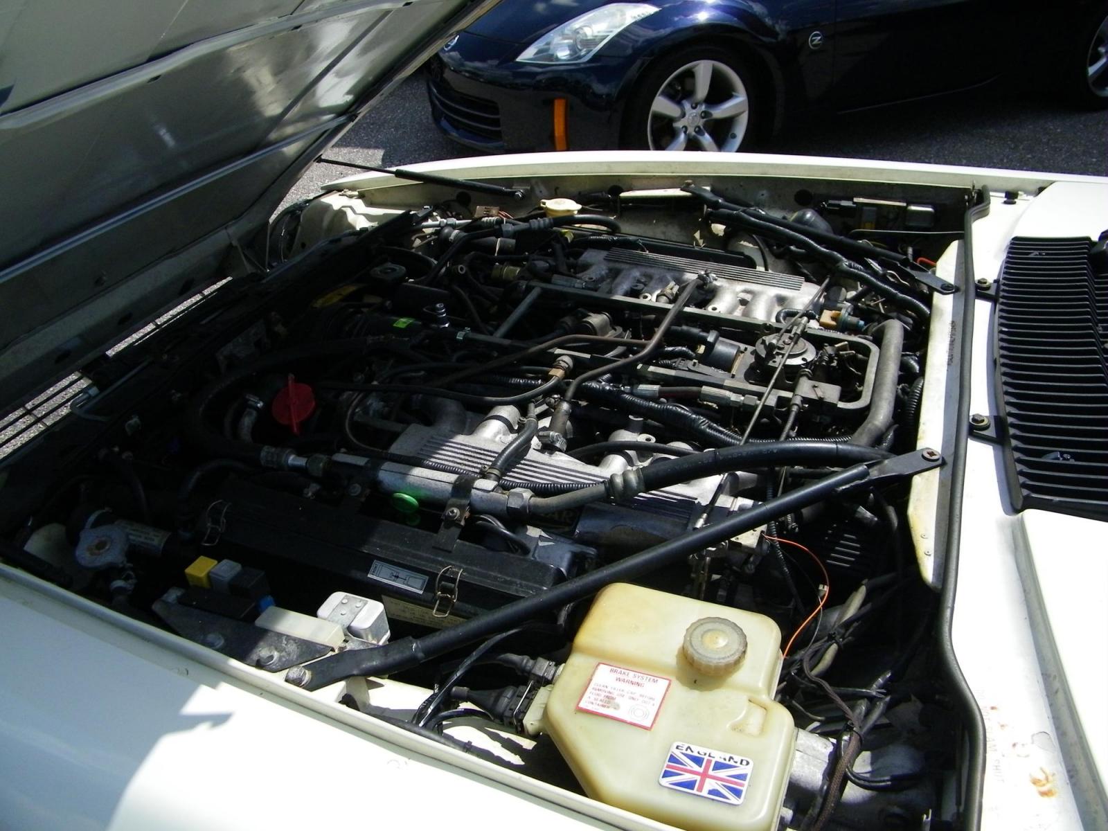 1990 White Jaguar XJS Convertible (SAJTW4843LC) with an 5.3L V12 SOHC 24V engine, 3-Speed Automatic transmission, located at 4000 Bee Ridge Road, Sarasota, FL, 34233, (941) 926-0300, 27.298664, -82.489151 - Photo #16