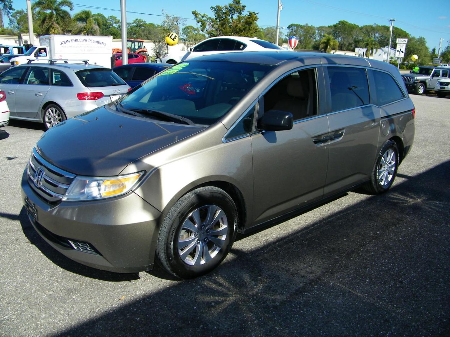 2013 Honda Odyssey LX (5FNRL5H26DB) with an 3.5L V6 SOHC 24V engine, 5-Speed Automatic transmission, located at 4000 Bee Ridge Road, Sarasota, FL, 34233, (941) 926-0300, 27.298664, -82.489151 - Photo#0