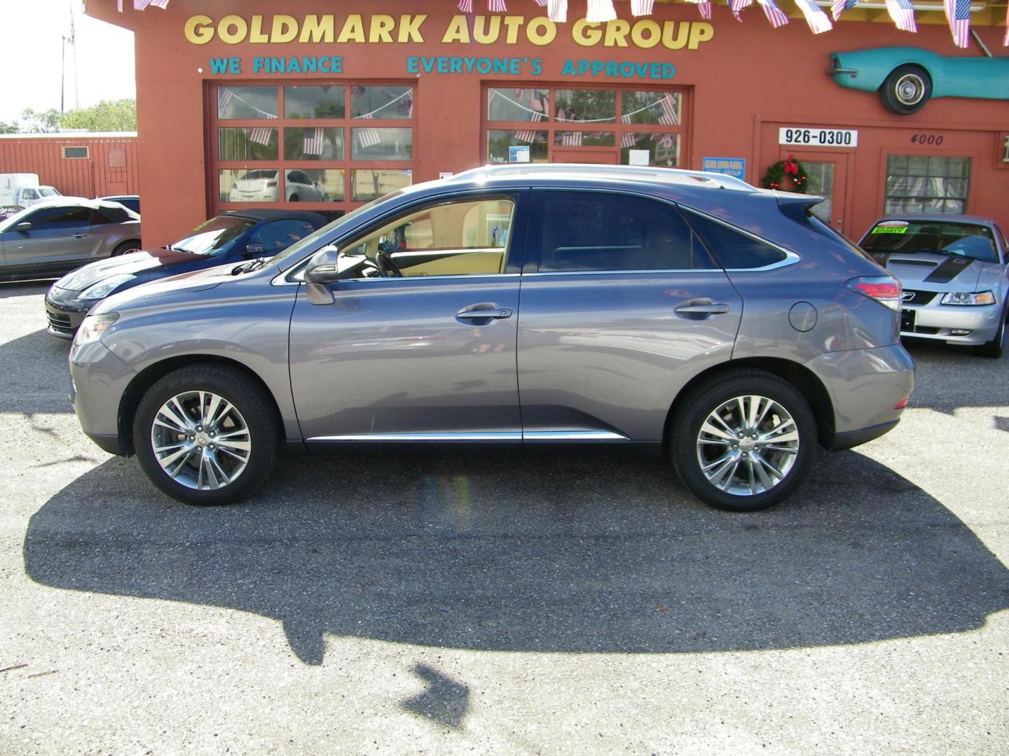 2013 Lexus RX 350 AWD (JTJBK1BA7D2) with an 3.5L V6 DOHC 24V engine, 5-Speed Automatic transmission, located at 4000 Bee Ridge Road, Sarasota, FL, 34233, (941) 926-0300, 27.298664, -82.489151 - Photo#2