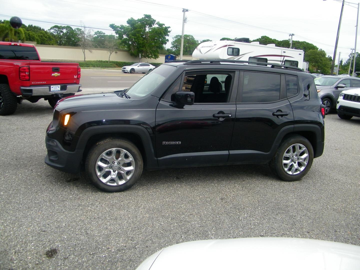 2018 Black /Black Jeep Renegade Latitude FWD (ZACCJABB2JP) with an 2.4L L4 DOHC 16V engine, Automatic transmission, located at 4000 Bee Ridge Road, Sarasota, FL, 34233, (941) 926-0300, 27.298664, -82.489151 - Photo#1