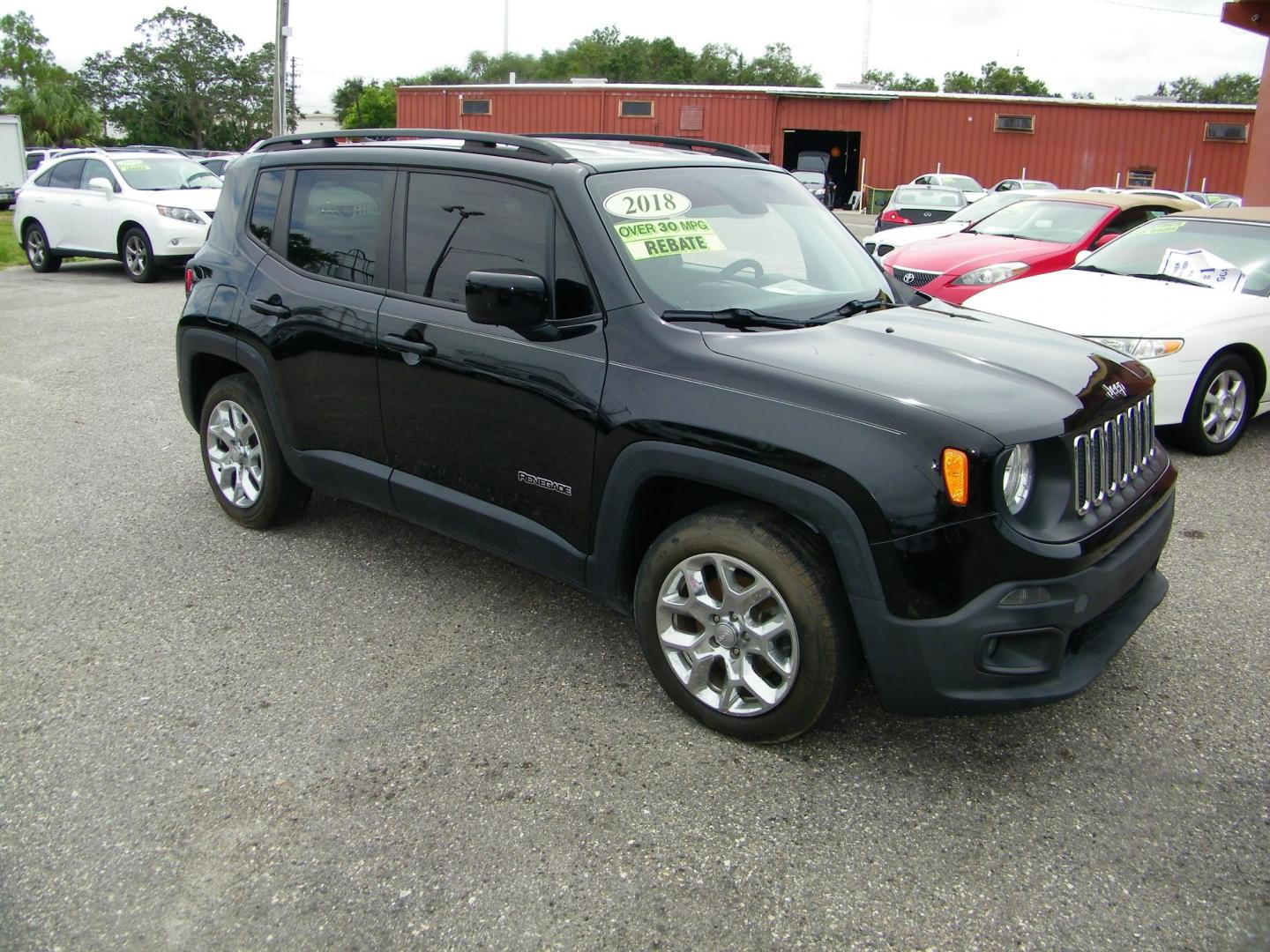 2018 Black /Black Jeep Renegade Latitude FWD (ZACCJABB2JP) with an 2.4L L4 DOHC 16V engine, Automatic transmission, located at 4000 Bee Ridge Road, Sarasota, FL, 34233, (941) 926-0300, 27.298664, -82.489151 - Photo#5