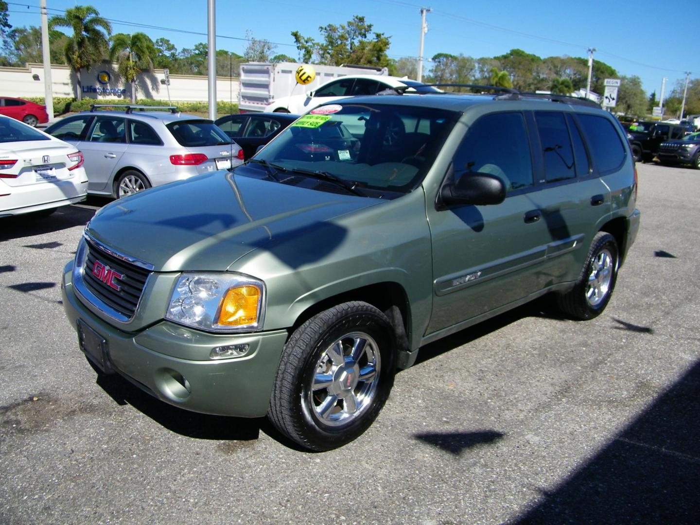 2003 GREEN GMC Envoy SLE 4WD (1GKDT13S632) with an 4.2L L6 DOHC 24V engine, 4-Speed Automatic Overdrive transmission, located at 4000 Bee Ridge Road, Sarasota, FL, 34233, (941) 926-0300, 27.298664, -82.489151 - Photo#0