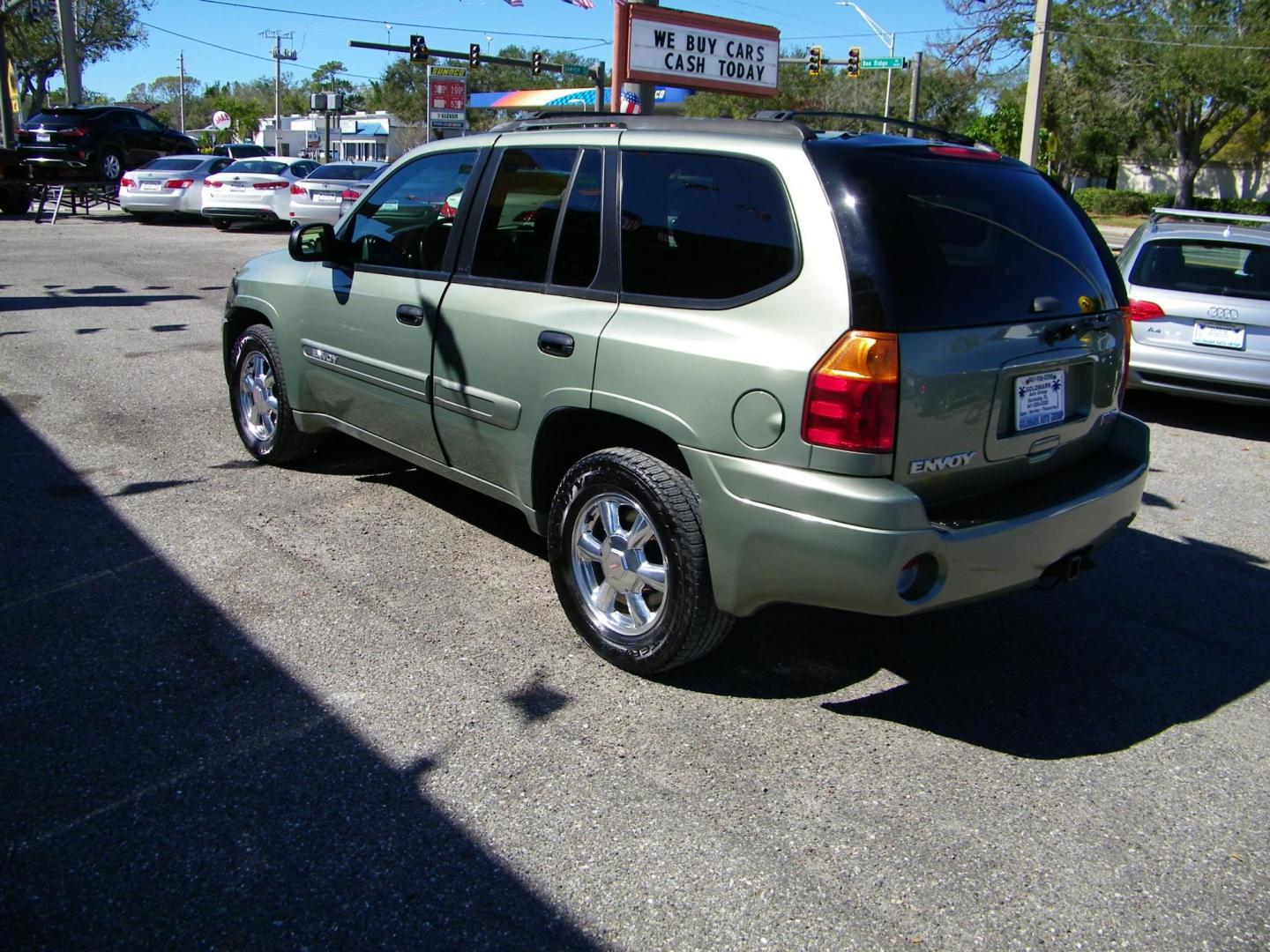 2003 GREEN GMC Envoy SLE 4WD (1GKDT13S632) with an 4.2L L6 DOHC 24V engine, 4-Speed Automatic Overdrive transmission, located at 4000 Bee Ridge Road, Sarasota, FL, 34233, (941) 926-0300, 27.298664, -82.489151 - Photo#3