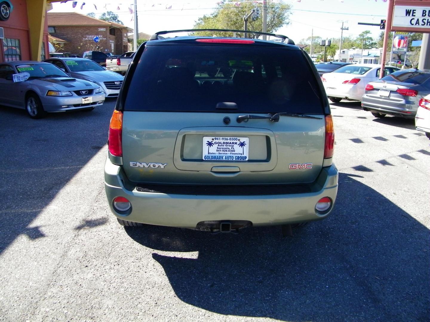 2003 GREEN GMC Envoy SLE 4WD (1GKDT13S632) with an 4.2L L6 DOHC 24V engine, 4-Speed Automatic Overdrive transmission, located at 4000 Bee Ridge Road, Sarasota, FL, 34233, (941) 926-0300, 27.298664, -82.489151 - Photo#4