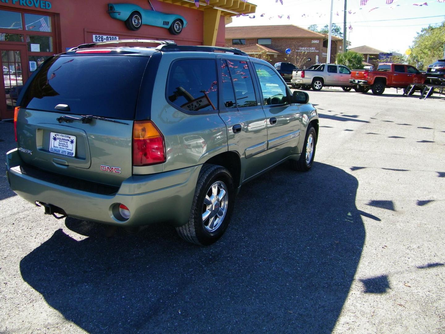 2003 GREEN GMC Envoy SLE 4WD (1GKDT13S632) with an 4.2L L6 DOHC 24V engine, 4-Speed Automatic Overdrive transmission, located at 4000 Bee Ridge Road, Sarasota, FL, 34233, (941) 926-0300, 27.298664, -82.489151 - Photo#5