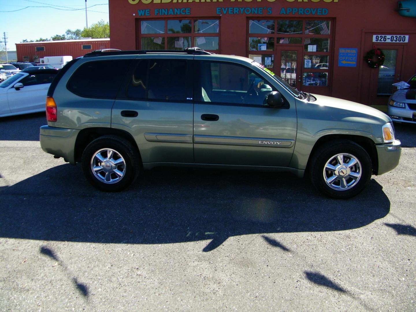 2003 GREEN GMC Envoy SLE 4WD (1GKDT13S632) with an 4.2L L6 DOHC 24V engine, 4-Speed Automatic Overdrive transmission, located at 4000 Bee Ridge Road, Sarasota, FL, 34233, (941) 926-0300, 27.298664, -82.489151 - Photo#6