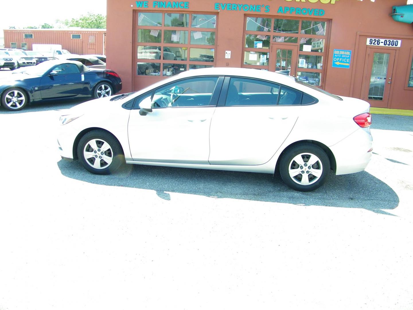 2018 Silver /Black Chevrolet Cruze LS Auto (1G1BC5SM8J7) with an 1.4L L4 DOHC 16V TURBO engine, 6A transmission, located at 4000 Bee Ridge Road, Sarasota, FL, 34233, (941) 926-0300, 27.298664, -82.489151 - Photo#2