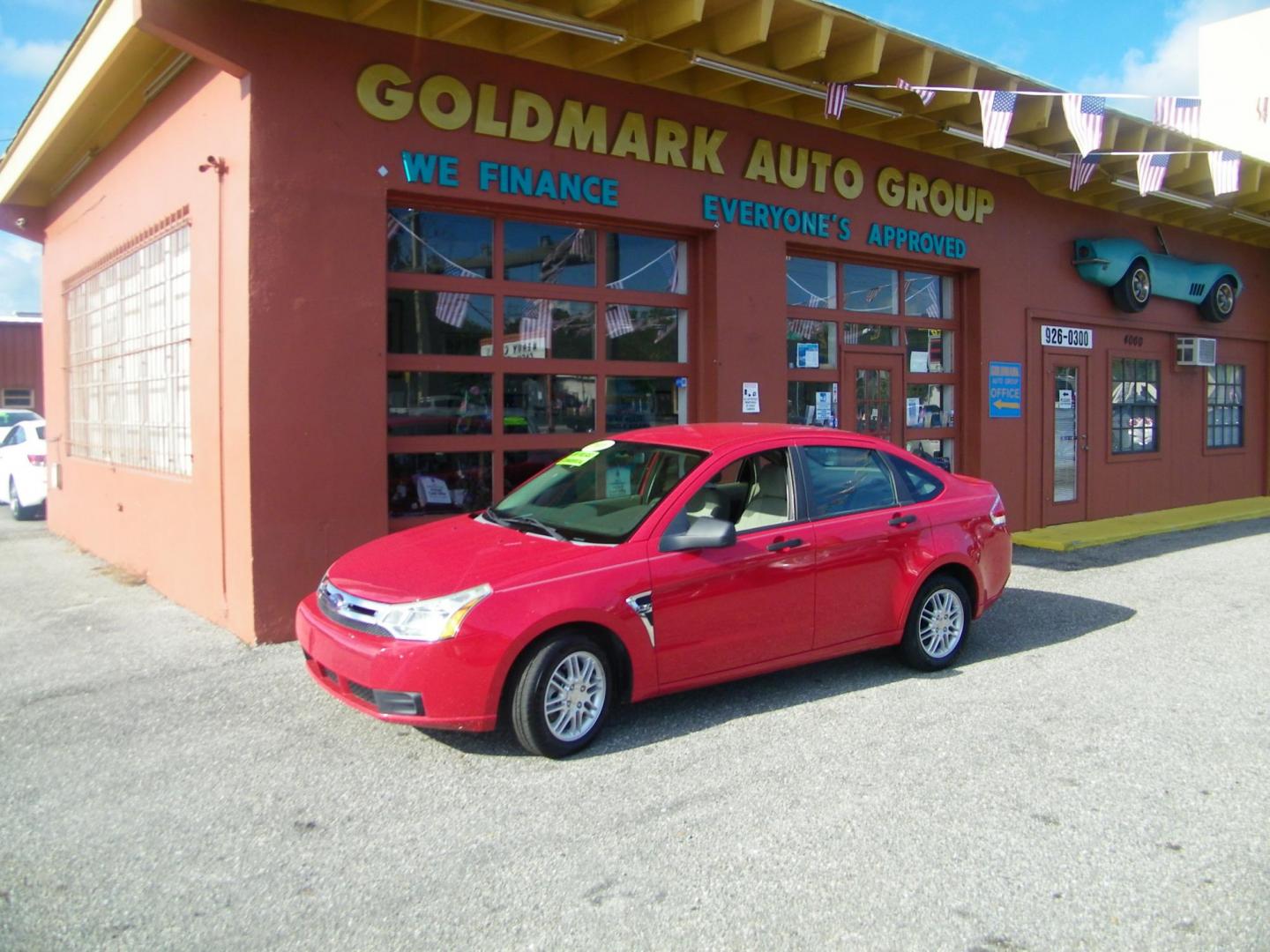 2008 Red /Gray Ford Focus SES Sedan (1FAHP35N08W) with an 2.0L L4 DOHC 16V engine, Automatic transmission, located at 4000 Bee Ridge Road, Sarasota, FL, 34233, (941) 926-0300, 27.298664, -82.489151 - Photo#0