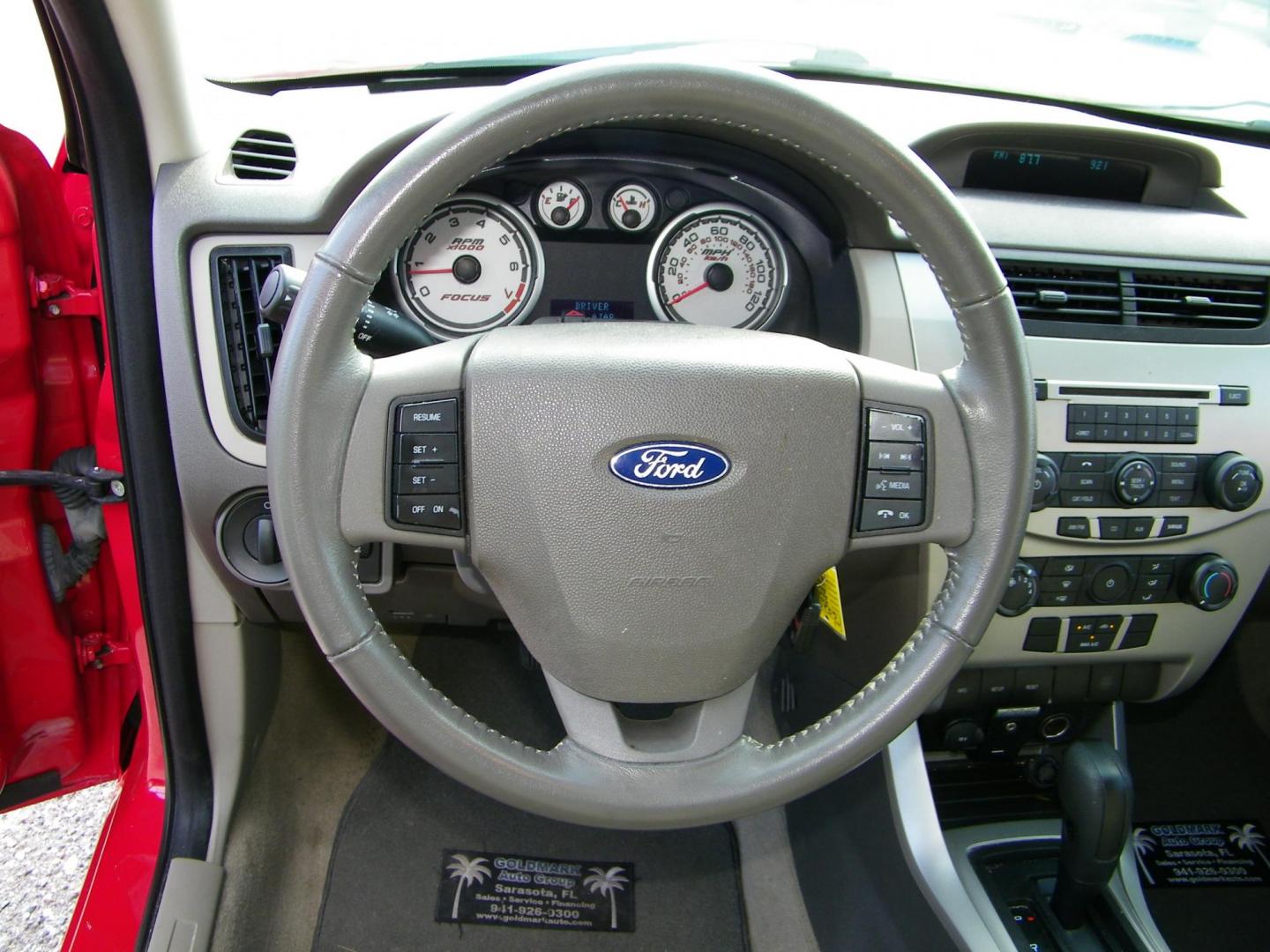 2008 Red /Gray Ford Focus SES Sedan (1FAHP35N08W) with an 2.0L L4 DOHC 16V engine, Automatic transmission, located at 4000 Bee Ridge Road, Sarasota, FL, 34233, (941) 926-0300, 27.298664, -82.489151 - Photo#16