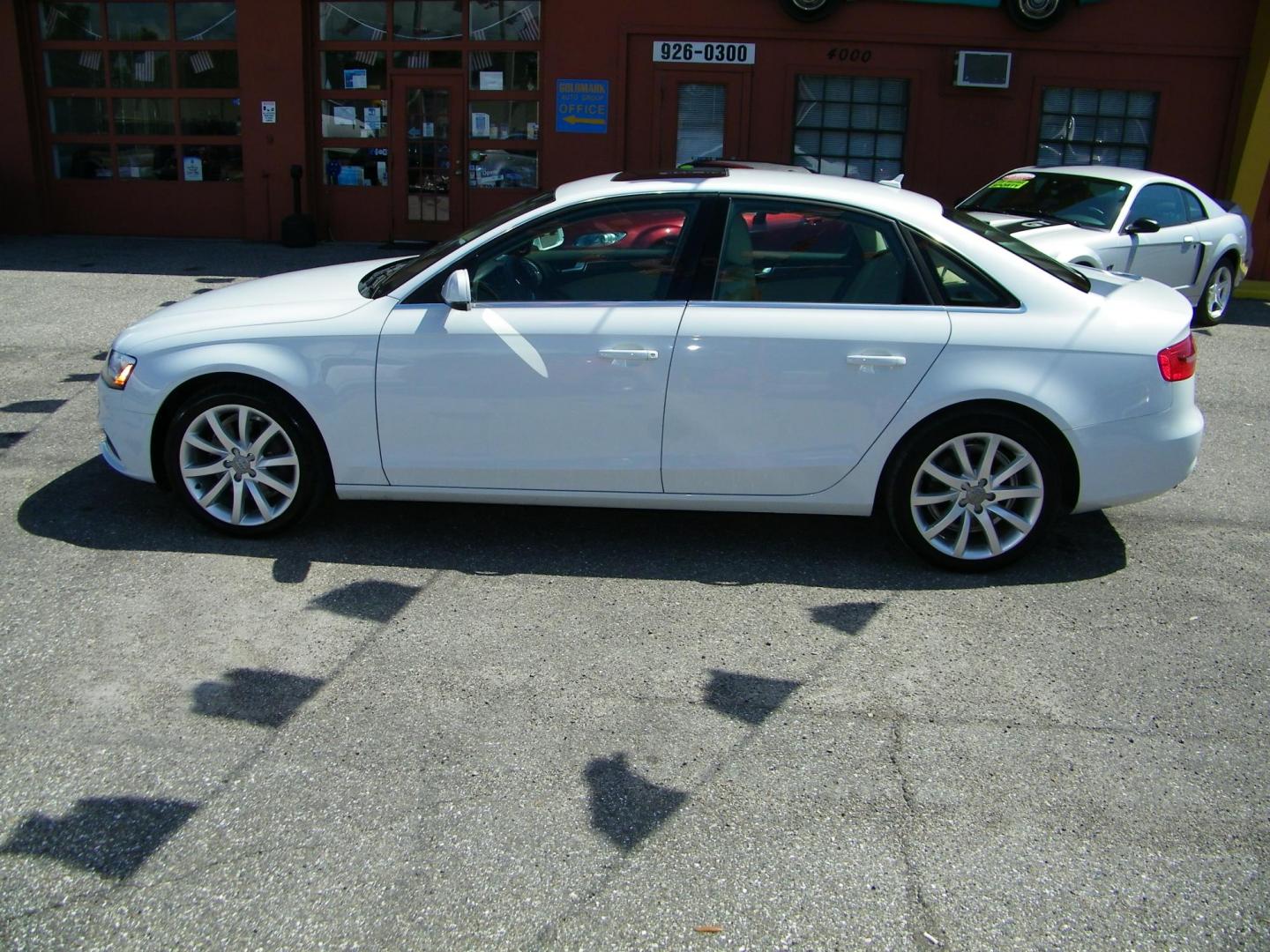 2013 White /Beige Audi A4 2.0T Premium Sedan quattro (WAUKFAFL9DA) with an 2.0L L4 DOHC 16V TURBO engine, AUTOMATIC transmission, located at 4000 Bee Ridge Road, Sarasota, FL, 34233, (941) 926-0300, 27.298664, -82.489151 - Photo#2