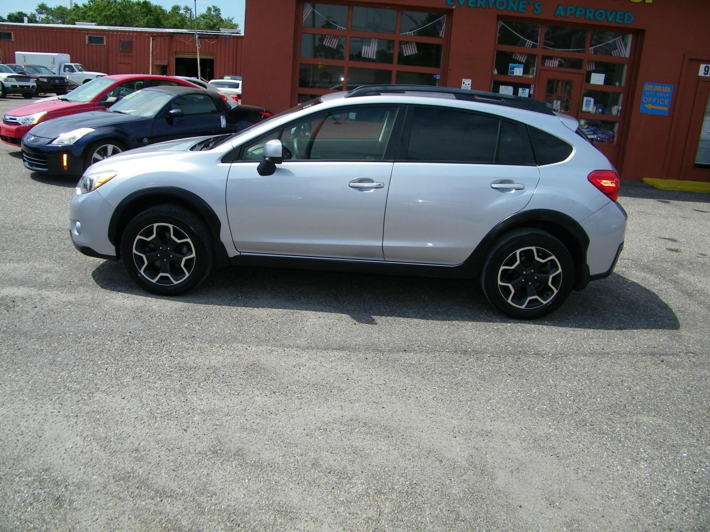 2013 Silver /Black Subaru XV Crosstrek 2.0 Premium (JF2GPAVC6D2) with an 2.0L L4 DOHC 16V engine, Continuously Variable Transmission transmission, located at 4000 Bee Ridge Road, Sarasota, FL, 34233, (941) 926-0300, 27.298664, -82.489151 - Photo#2