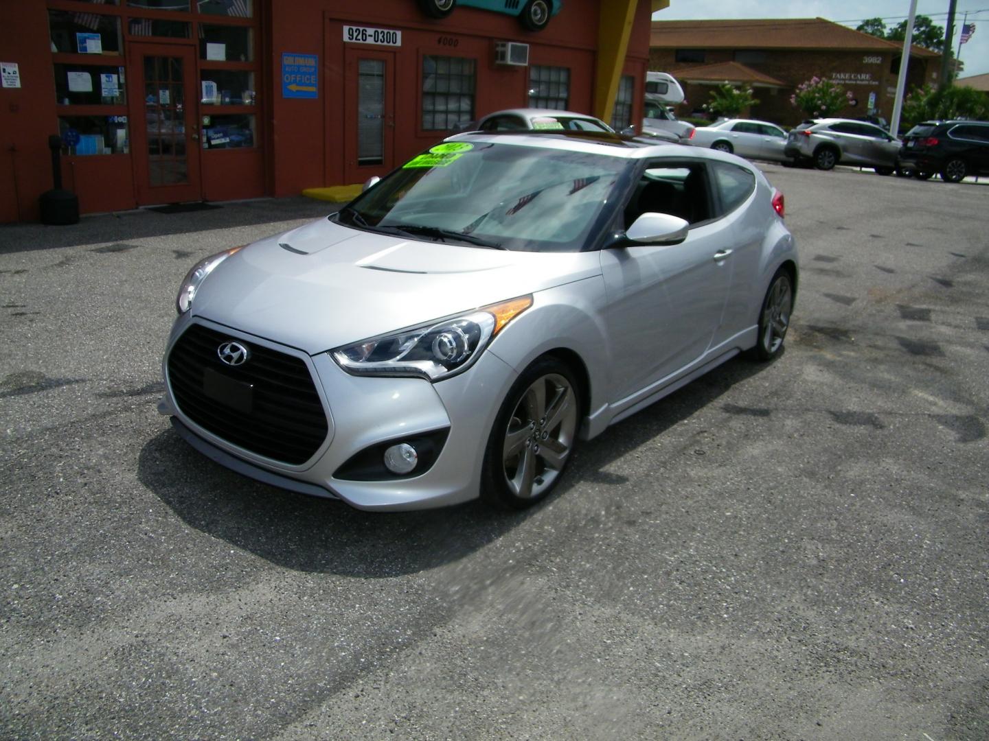 2013 Silver Hyundai Veloster Base (KMHTC6AE6DU) with an 1.6L L4 DOHC 16V TURBO engine, 6-Speed Automatic transmission, located at 4000 Bee Ridge Road, Sarasota, FL, 34233, (941) 926-0300, 27.298664, -82.489151 - Photo#0