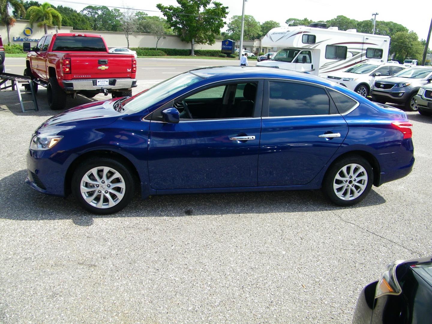 2019 Blue /BLACK Nissan Sentra S CVT (3N1AB7AP8KY) with an 1.8L L4 SFI DOHC 16V engine, CVT transmission, located at 4000 Bee Ridge Road, Sarasota, FL, 34233, (941) 926-0300, 27.298664, -82.489151 - Photo#2