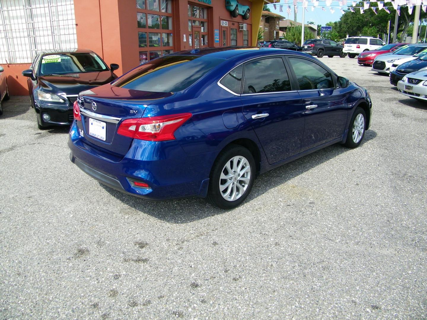 2019 Blue /BLACK Nissan Sentra S CVT (3N1AB7AP8KY) with an 1.8L L4 SFI DOHC 16V engine, CVT transmission, located at 4000 Bee Ridge Road, Sarasota, FL, 34233, (941) 926-0300, 27.298664, -82.489151 - Photo#4