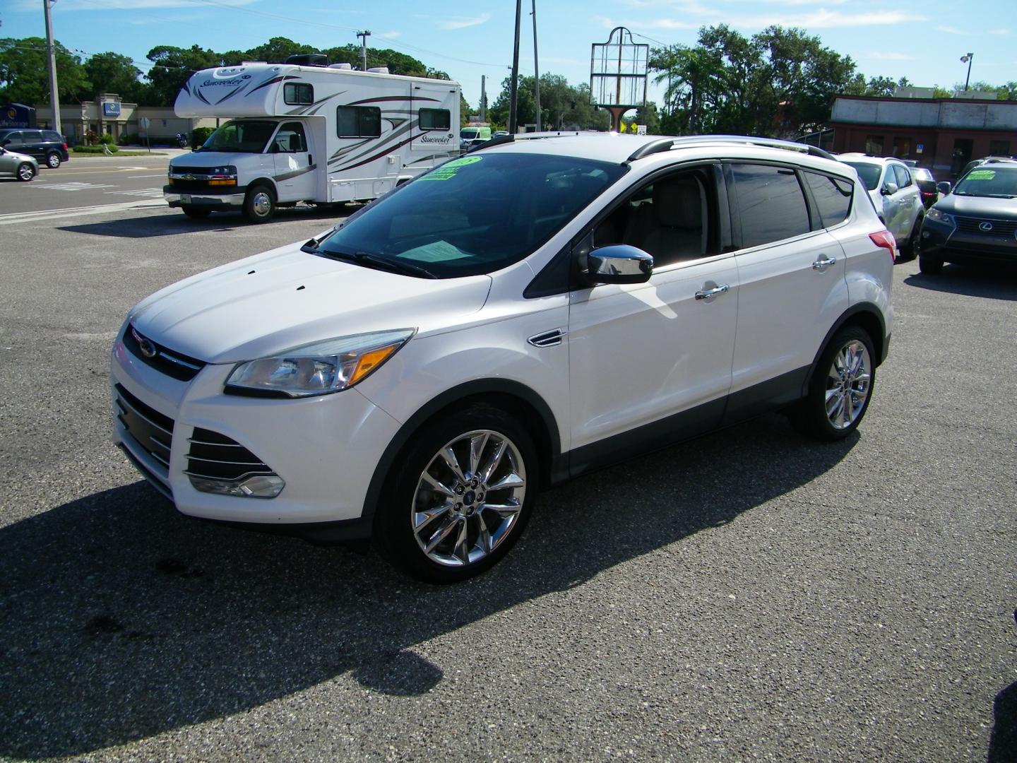 2015 White /BLACK Ford Escape SE 4WD (1FMCU9GX4FU) with an 1.6L L4 DOHC 16V engine, 6-Speed Automatic transmission, located at 4000 Bee Ridge Road, Sarasota, FL, 34233, (941) 926-0300, 27.298664, -82.489151 - Photo#0