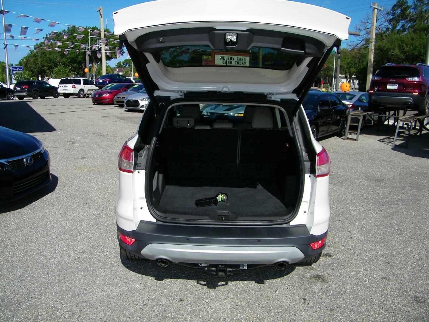 2015 White /BLACK Ford Escape SE 4WD (1FMCU9GX4FU) with an 1.6L L4 DOHC 16V engine, 6-Speed Automatic transmission, located at 4000 Bee Ridge Road, Sarasota, FL, 34233, (941) 926-0300, 27.298664, -82.489151 - Photo#11