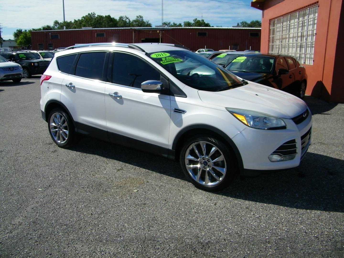 2015 White /BLACK Ford Escape SE 4WD (1FMCU9GX4FU) with an 1.6L L4 DOHC 16V engine, 6-Speed Automatic transmission, located at 4000 Bee Ridge Road, Sarasota, FL, 34233, (941) 926-0300, 27.298664, -82.489151 - Photo#7