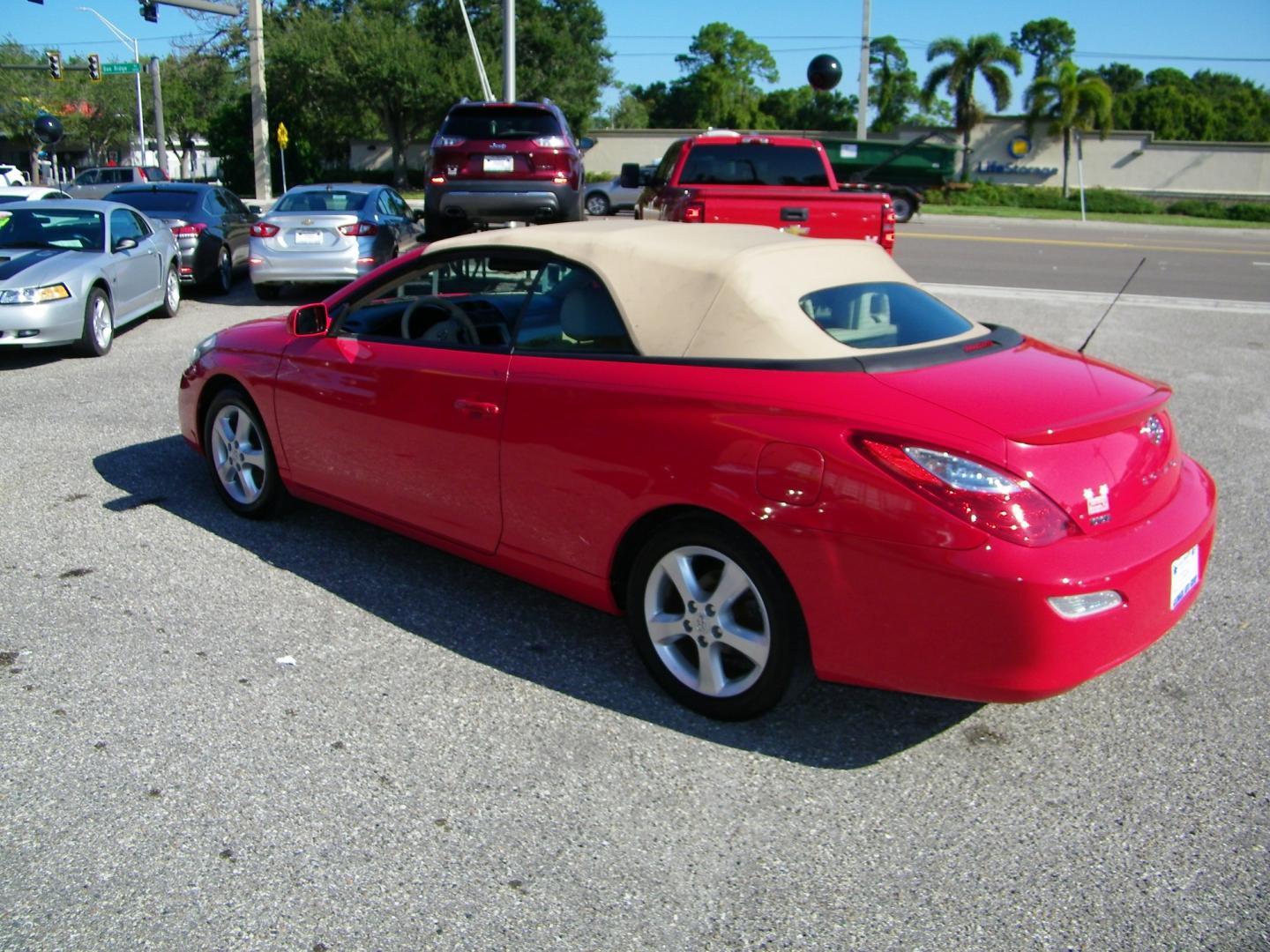 2008 Red /BLACK Toyota Camry Solara SE Convertible (4T1FA38P98U) with an 3.3L V6 DOHC 24V engine, 5-Speed Automatic Overdrive transmission, located at 4000 Bee Ridge Road, Sarasota, FL, 34233, (941) 926-0300, 27.298664, -82.489151 - Photo#3