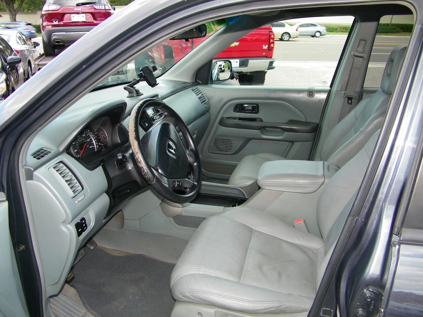 2004 Gray /Gray Honda Pilot EX w/ Leather and DVD (2HKYF18624H) with an 3.5L V6 SOHC 24V engine, 5-Speed Automatic Overdrive transmission, located at 4000 Bee Ridge Road, Sarasota, FL, 34233, (941) 926-0300, 27.298664, -82.489151 - Photo#19