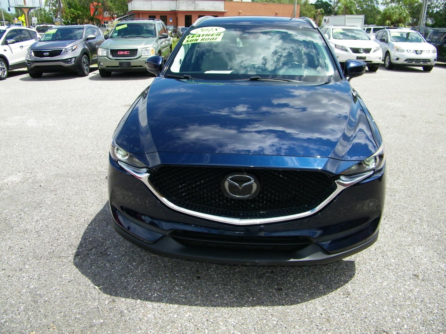 2018 Blue /Black Mazda CX-5 Touring (JM3KFACM2J0) with an 2.5L L4 DOHC 16V engine, Automatic transmission, located at 4000 Bee Ridge Road, Sarasota, FL, 34233, (941) 926-0300, 27.298664, -82.489151 - Photo#1