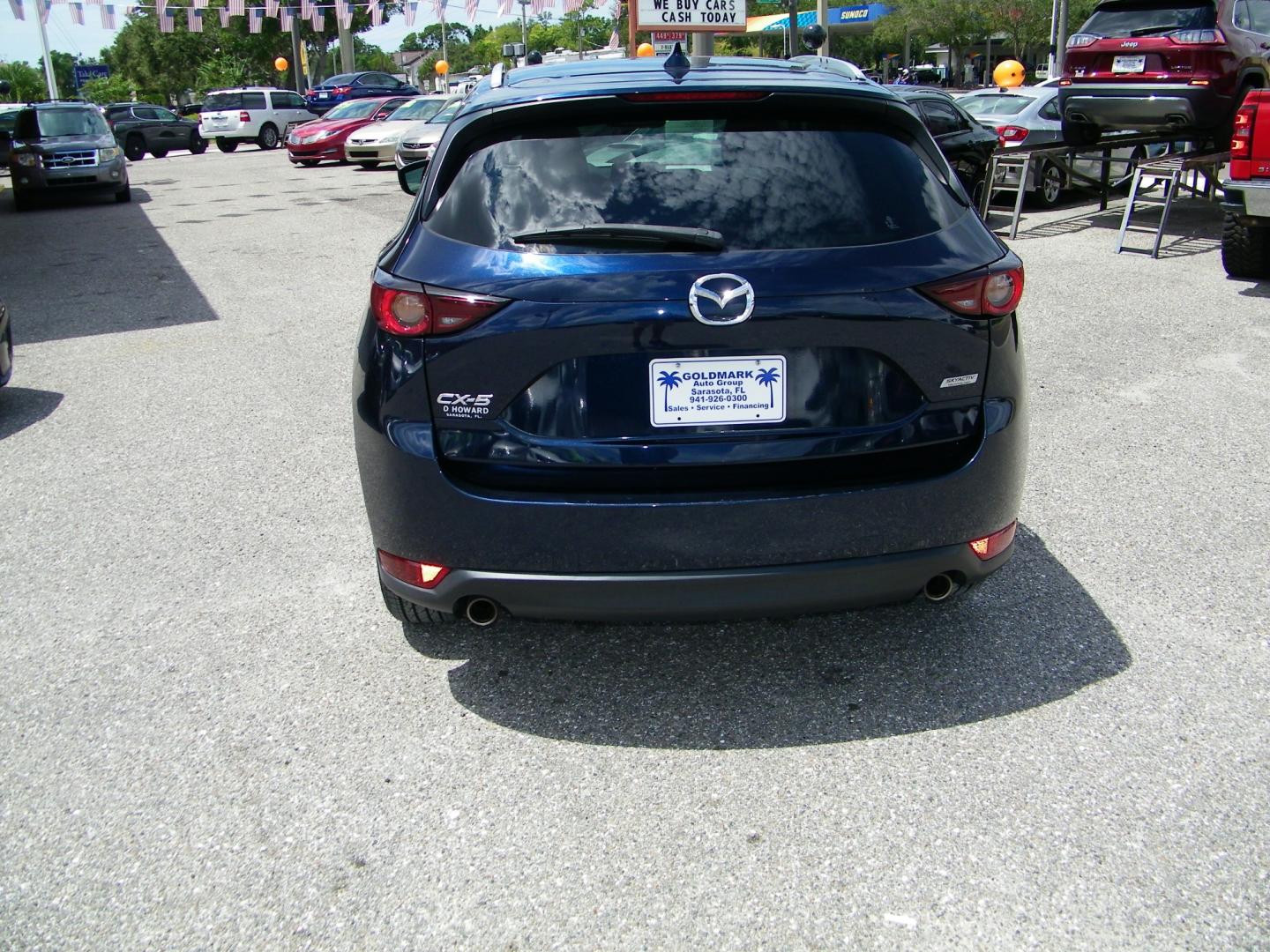 2018 Blue /Black Mazda CX-5 Touring (JM3KFACM2J0) with an 2.5L L4 DOHC 16V engine, Automatic transmission, located at 4000 Bee Ridge Road, Sarasota, FL, 34233, (941) 926-0300, 27.298664, -82.489151 - Photo#4