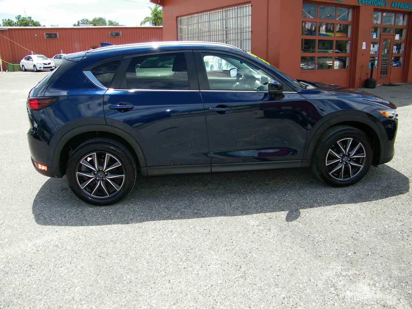 2018 Blue /Black Mazda CX-5 Touring (JM3KFACM2J0) with an 2.5L L4 DOHC 16V engine, Automatic transmission, located at 4000 Bee Ridge Road, Sarasota, FL, 34233, (941) 926-0300, 27.298664, -82.489151 - Photo#6