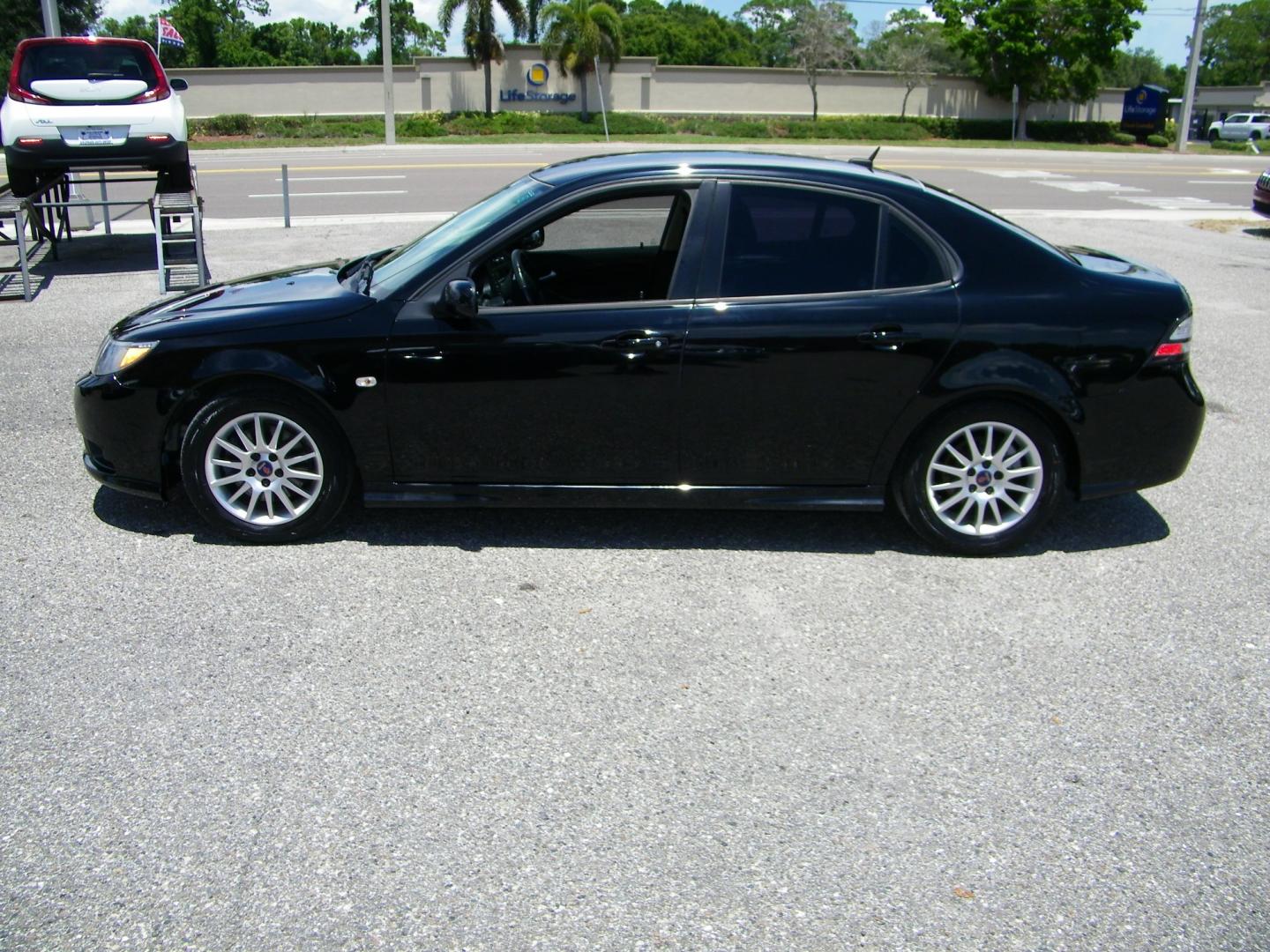 2008 Black /Black Saab 9-3 2.0T (YS3FB49Y881) with an 2.0L L4 DOHC 16V TURBO engine, 5-Speed Automatic Overdrive transmission, located at 4000 Bee Ridge Road, Sarasota, FL, 34233, (941) 926-0300, 27.298664, -82.489151 - Photo#2