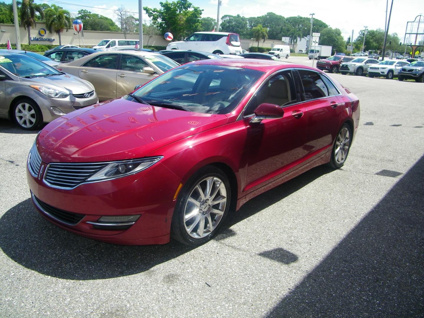 2014 Red /Beige Lincoln MKZ FWD (3LN6L2G93ER) with an 2.0L L4 DOHC 16V engine, 6-Speed Automatic transmission, located at 4000 Bee Ridge Road, Sarasota, FL, 34233, (941) 926-0300, 27.298664, -82.489151 - Photo#0