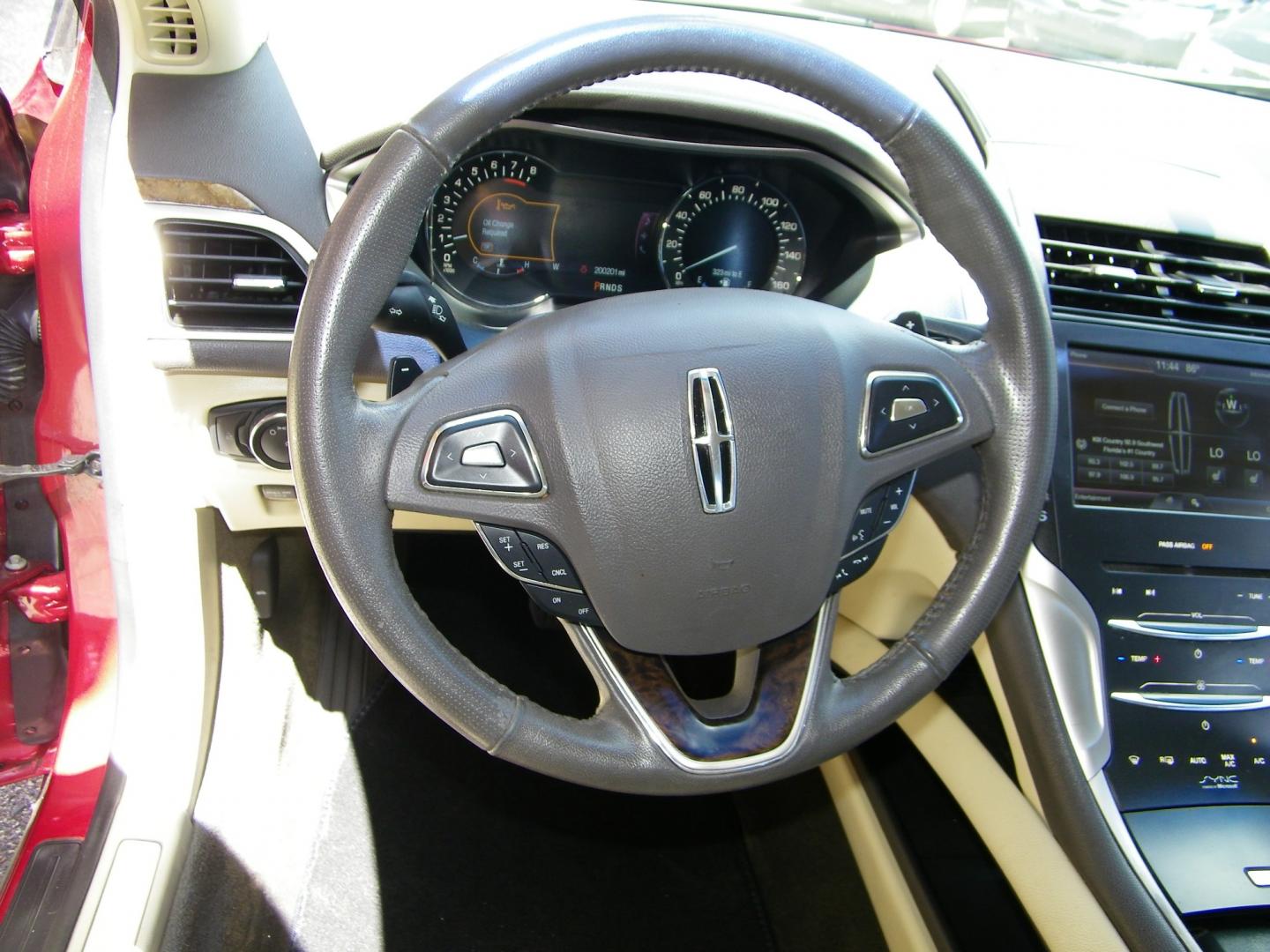 2014 Red /Beige Lincoln MKZ FWD (3LN6L2G93ER) with an 2.0L L4 DOHC 16V engine, 6-Speed Automatic transmission, located at 4000 Bee Ridge Road, Sarasota, FL, 34233, (941) 926-0300, 27.298664, -82.489151 - Photo#16