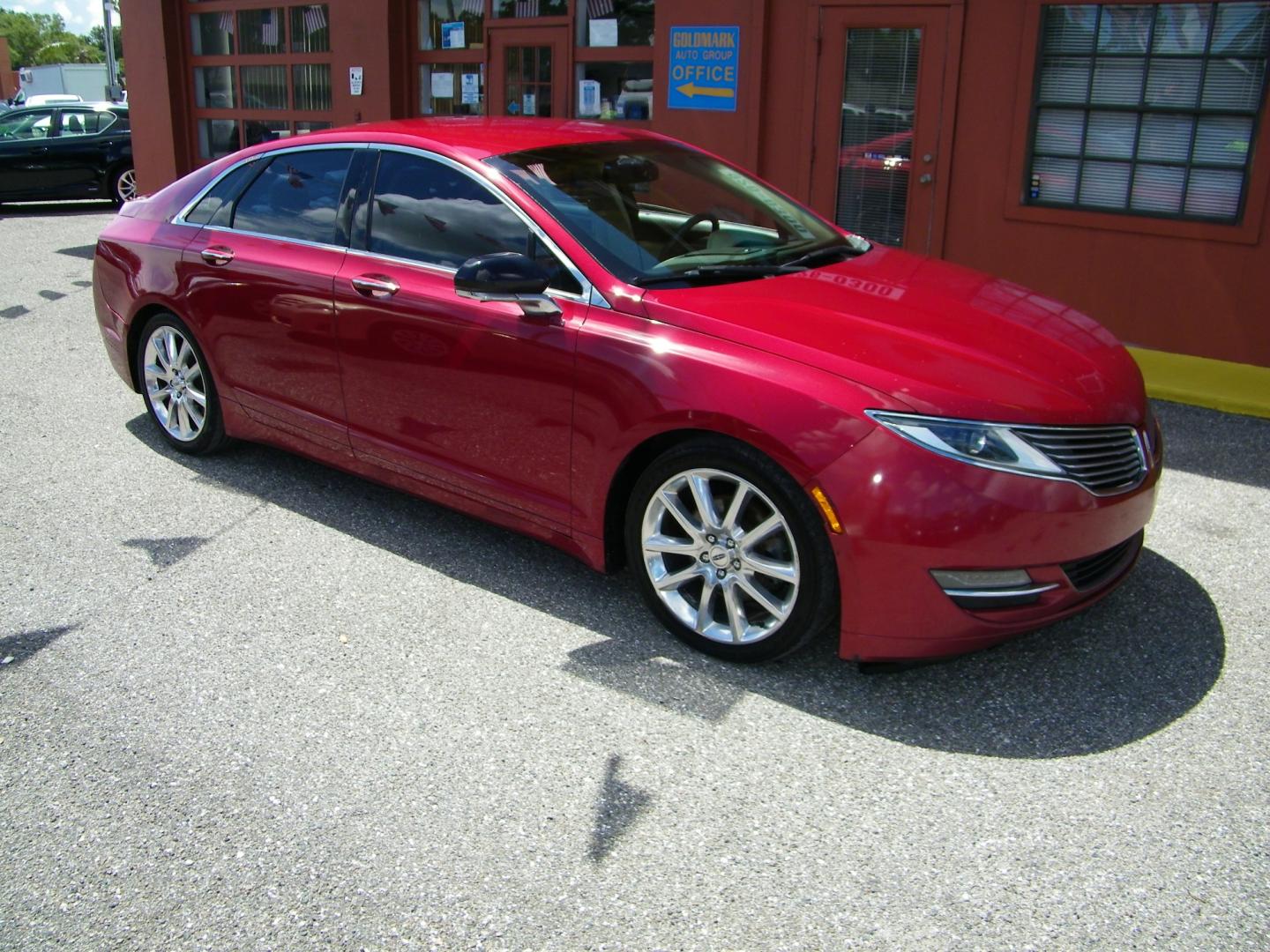 2014 Red /Beige Lincoln MKZ FWD (3LN6L2G93ER) with an 2.0L L4 DOHC 16V engine, 6-Speed Automatic transmission, located at 4000 Bee Ridge Road, Sarasota, FL, 34233, (941) 926-0300, 27.298664, -82.489151 - Photo#4