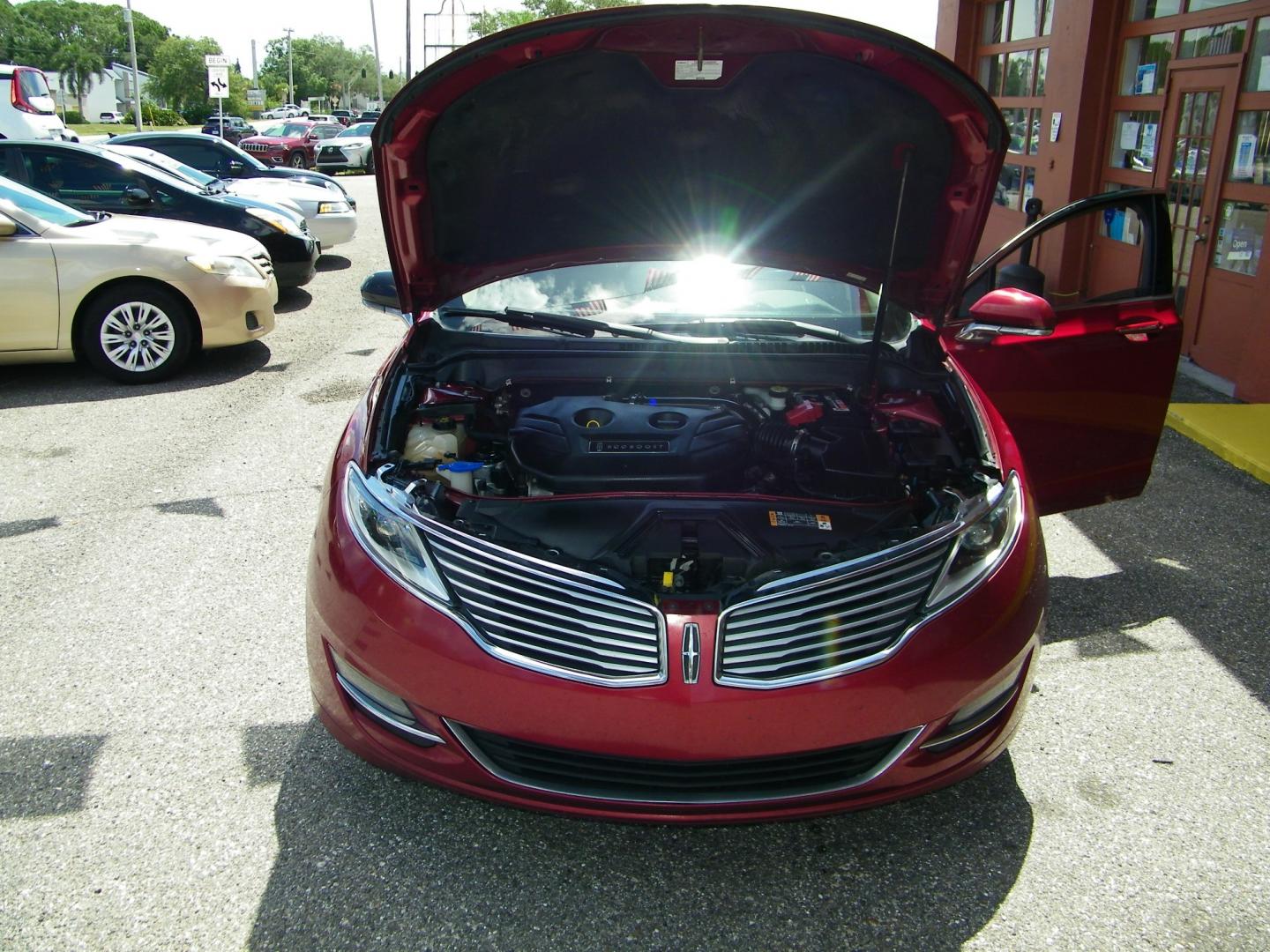 2014 Red /Beige Lincoln MKZ FWD (3LN6L2G93ER) with an 2.0L L4 DOHC 16V engine, 6-Speed Automatic transmission, located at 4000 Bee Ridge Road, Sarasota, FL, 34233, (941) 926-0300, 27.298664, -82.489151 - Photo#7