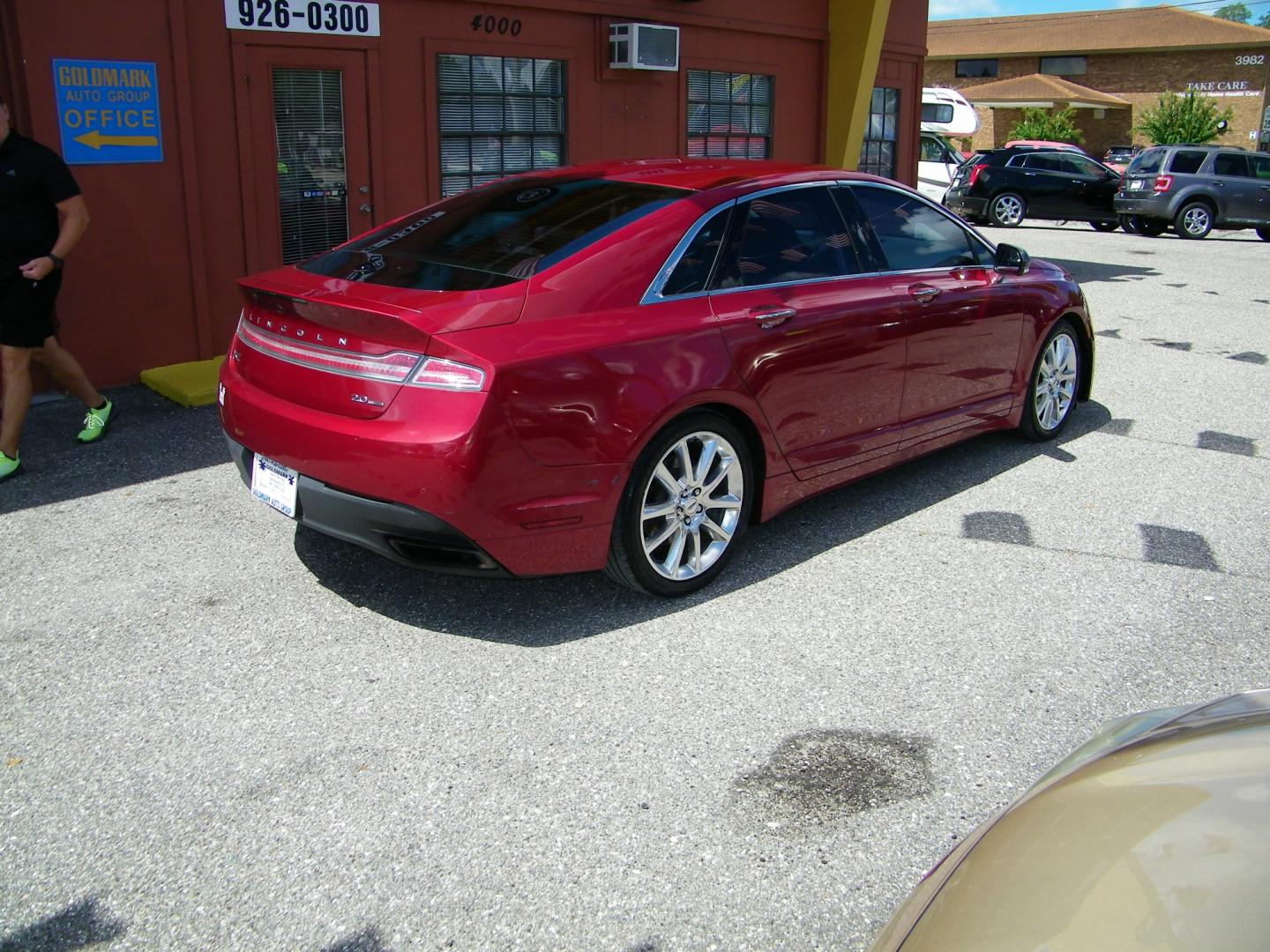 2014 Red /Beige Lincoln MKZ FWD (3LN6L2G93ER) with an 2.0L L4 DOHC 16V engine, 6-Speed Automatic transmission, located at 4000 Bee Ridge Road, Sarasota, FL, 34233, (941) 926-0300, 27.298664, -82.489151 - Photo#8