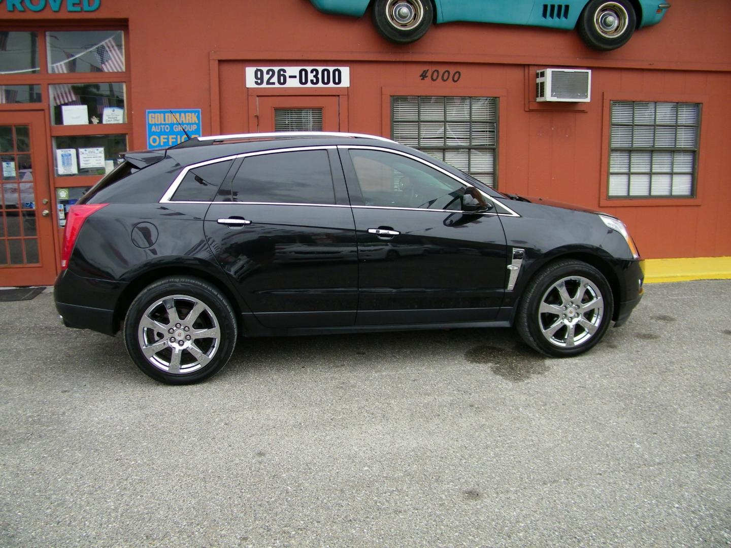 2012 Black /Black Cadillac SRX Premium (3GYFNCE36CS) with an 3.6L V6 DOHC 24V FFV engine, 6-Speed Automatic transmission, located at 4000 Bee Ridge Road, Sarasota, FL, 34233, (941) 926-0300, 27.298664, -82.489151 - Photo#7