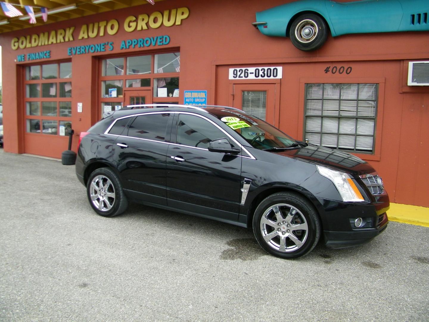 2012 Black /Black Cadillac SRX Premium (3GYFNCE36CS) with an 3.6L V6 DOHC 24V FFV engine, 6-Speed Automatic transmission, located at 4000 Bee Ridge Road, Sarasota, FL, 34233, (941) 926-0300, 27.298664, -82.489151 - Photo#8