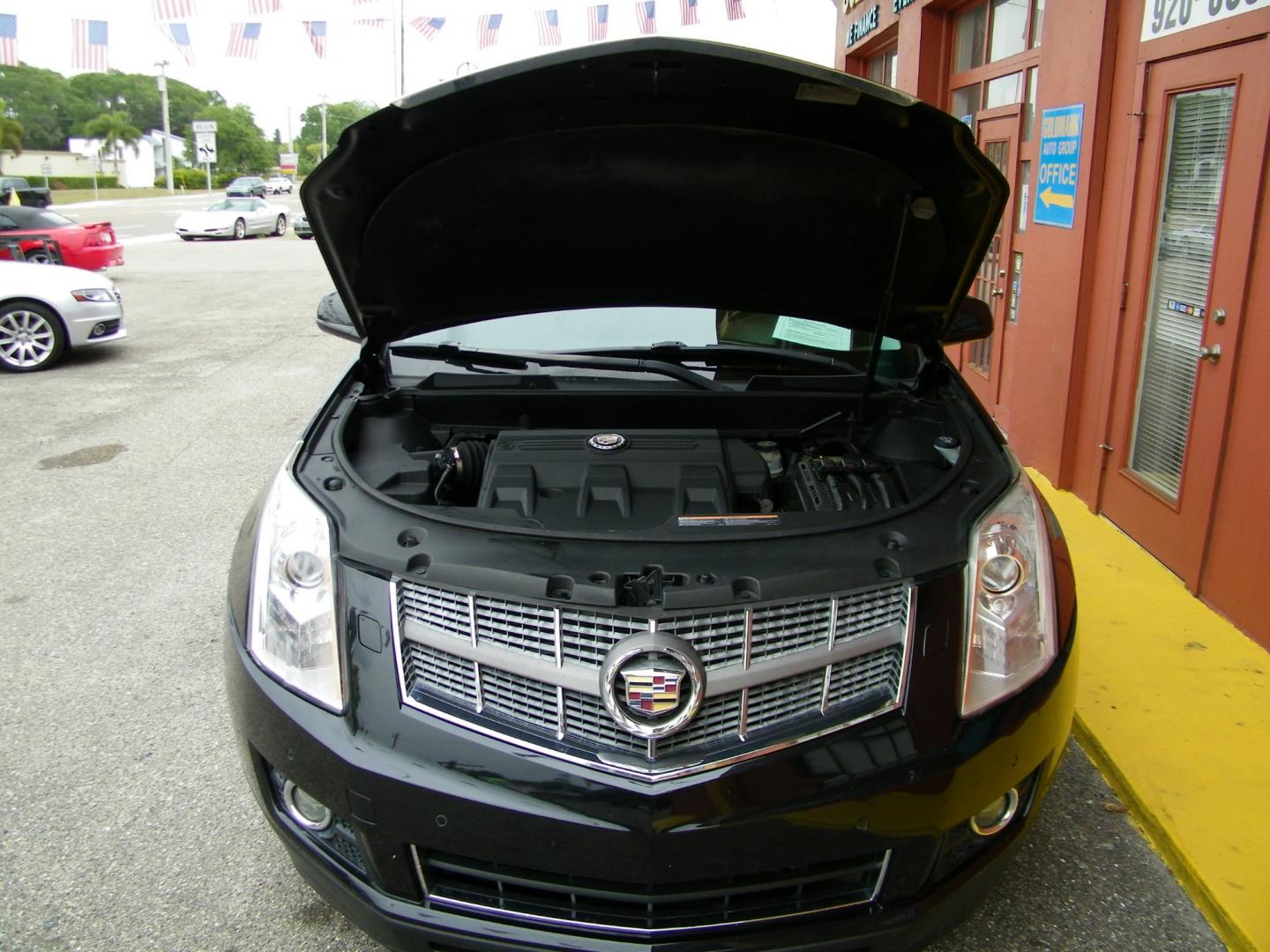 2012 Black /Black Cadillac SRX Premium (3GYFNCE36CS) with an 3.6L V6 DOHC 24V FFV engine, 6-Speed Automatic transmission, located at 4000 Bee Ridge Road, Sarasota, FL, 34233, (941) 926-0300, 27.298664, -82.489151 - Photo#9