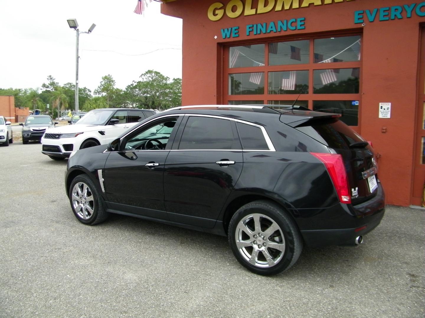 2012 Black /Black Cadillac SRX Premium (3GYFNCE36CS) with an 3.6L V6 DOHC 24V FFV engine, 6-Speed Automatic transmission, located at 4000 Bee Ridge Road, Sarasota, FL, 34233, (941) 926-0300, 27.298664, -82.489151 - Photo#3