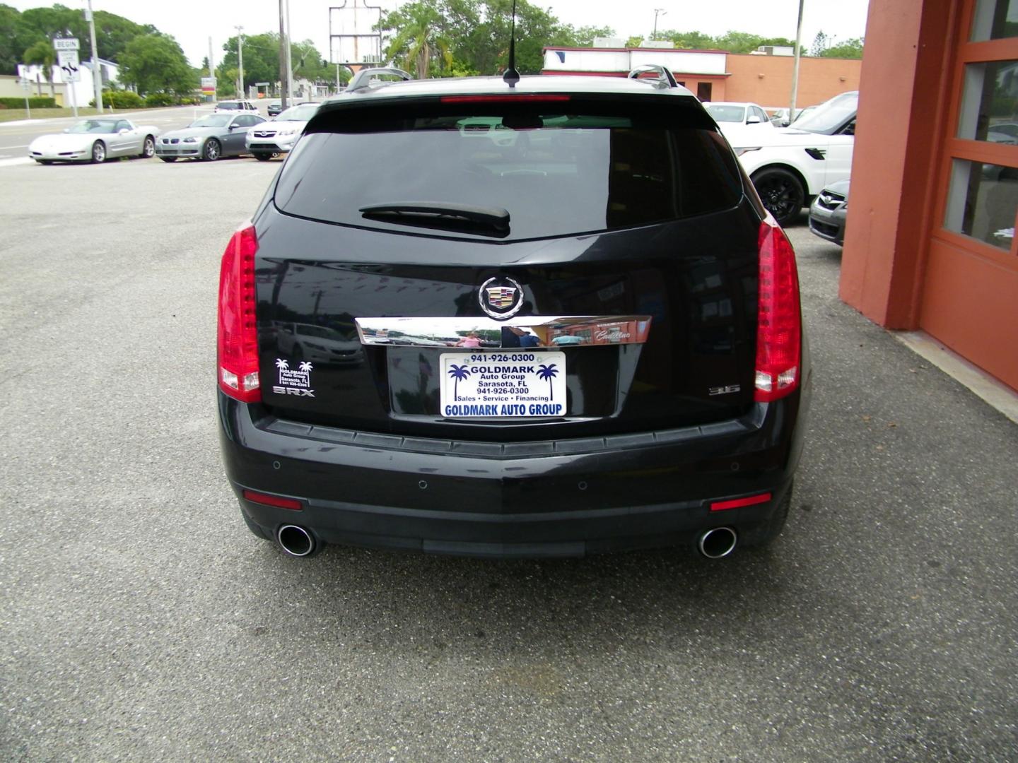 2012 Black /Black Cadillac SRX Premium (3GYFNCE36CS) with an 3.6L V6 DOHC 24V FFV engine, 6-Speed Automatic transmission, located at 4000 Bee Ridge Road, Sarasota, FL, 34233, (941) 926-0300, 27.298664, -82.489151 - Photo#4