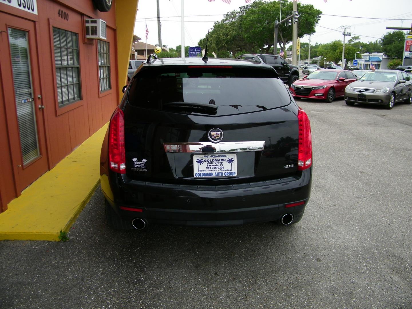 2012 Black /Black Cadillac SRX Premium (3GYFNCE36CS) with an 3.6L V6 DOHC 24V FFV engine, 6-Speed Automatic transmission, located at 4000 Bee Ridge Road, Sarasota, FL, 34233, (941) 926-0300, 27.298664, -82.489151 - Photo#5