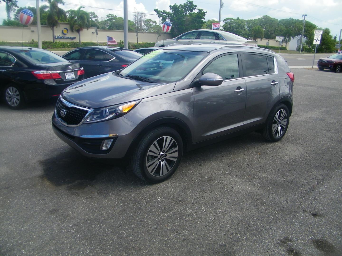 2015 Brown /Beige Kia Sportage EX FWD (KNDPC3AC6F7) with an 2.4L V6 DOHC 24V engine, 6-Speed Automatic transmission, located at 4000 Bee Ridge Road, Sarasota, FL, 34233, (941) 926-0300, 27.298664, -82.489151 - Photo#0