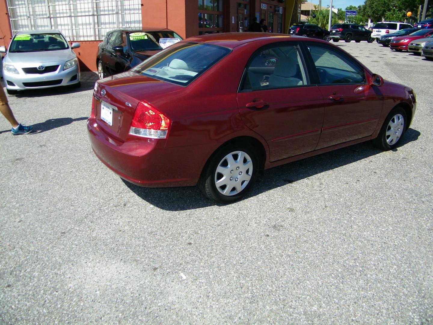 2007 Maroon /Beige Kia Spectra EX (KNAFE121075) with an 2.0L L4 DOHC 16V engine, Automatic transmission, located at 4000 Bee Ridge Road, Sarasota, FL, 34233, (941) 926-0300, 27.298664, -82.489151 - Photo#5