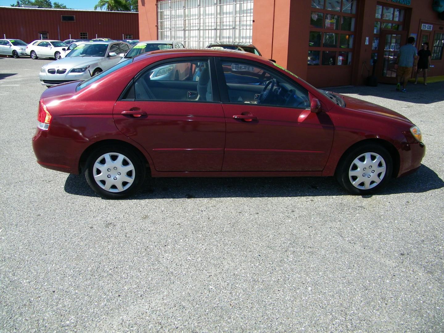 2007 Maroon /Beige Kia Spectra EX (KNAFE121075) with an 2.0L L4 DOHC 16V engine, Automatic transmission, located at 4000 Bee Ridge Road, Sarasota, FL, 34233, (941) 926-0300, 27.298664, -82.489151 - Photo#6