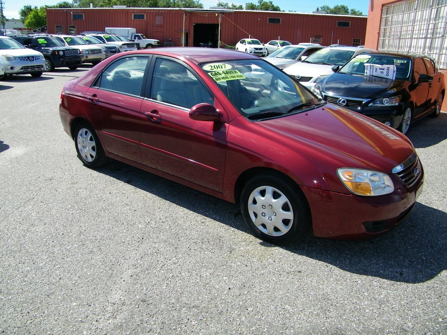 2007 Maroon /Beige Kia Spectra EX (KNAFE121075) with an 2.0L L4 DOHC 16V engine, Automatic transmission, located at 4000 Bee Ridge Road, Sarasota, FL, 34233, (941) 926-0300, 27.298664, -82.489151 - Photo#7