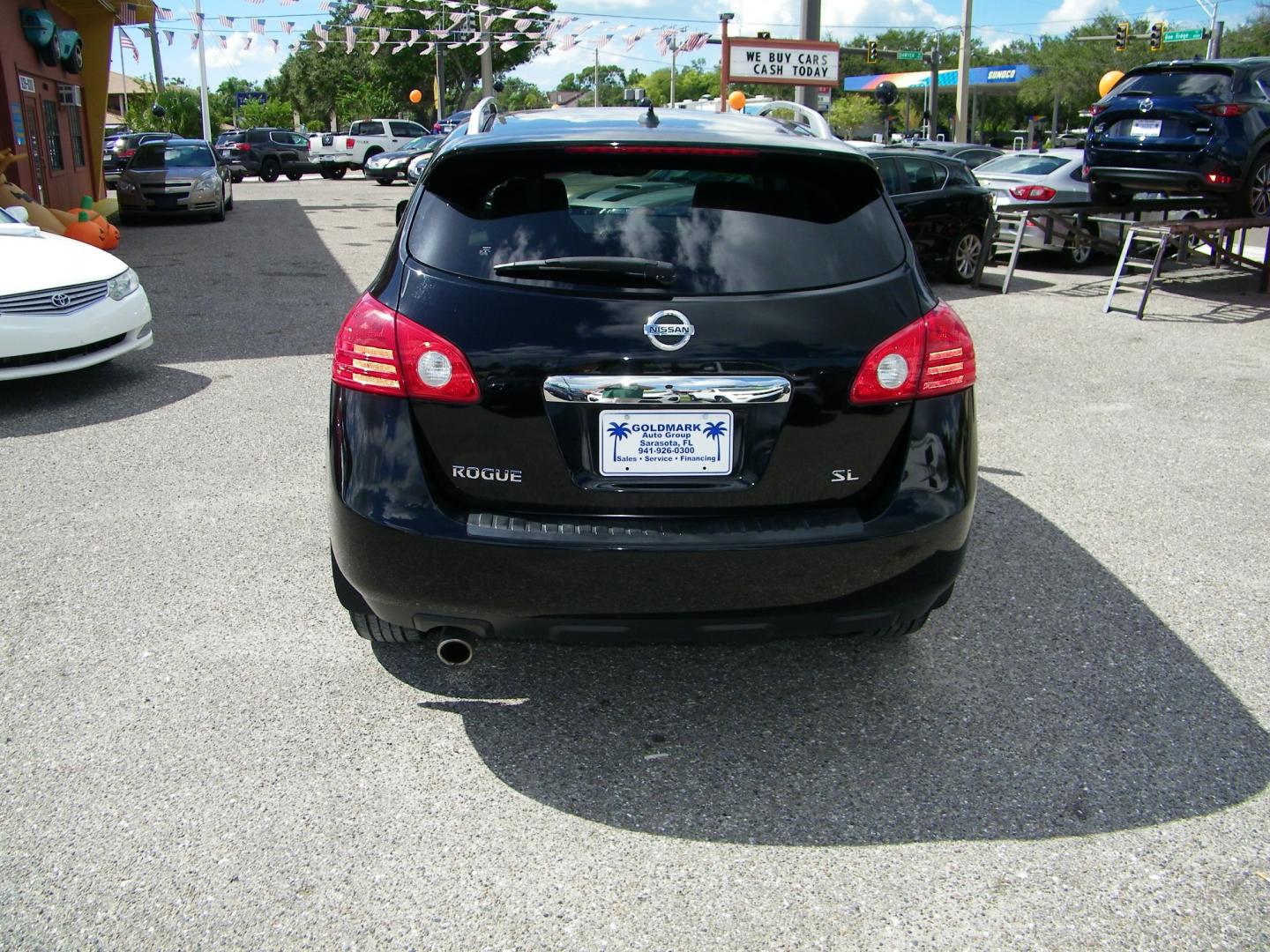 2012 Black /Tan Nissan Rogue S FWD Krom Edition (JN8AS5MT2CW) with an 2.5L L4 DOHC 16V engine, Continuously Variable Transmission transmission, located at 4000 Bee Ridge Road, Sarasota, FL, 34233, (941) 926-0300, 27.298664, -82.489151 - Photo#4