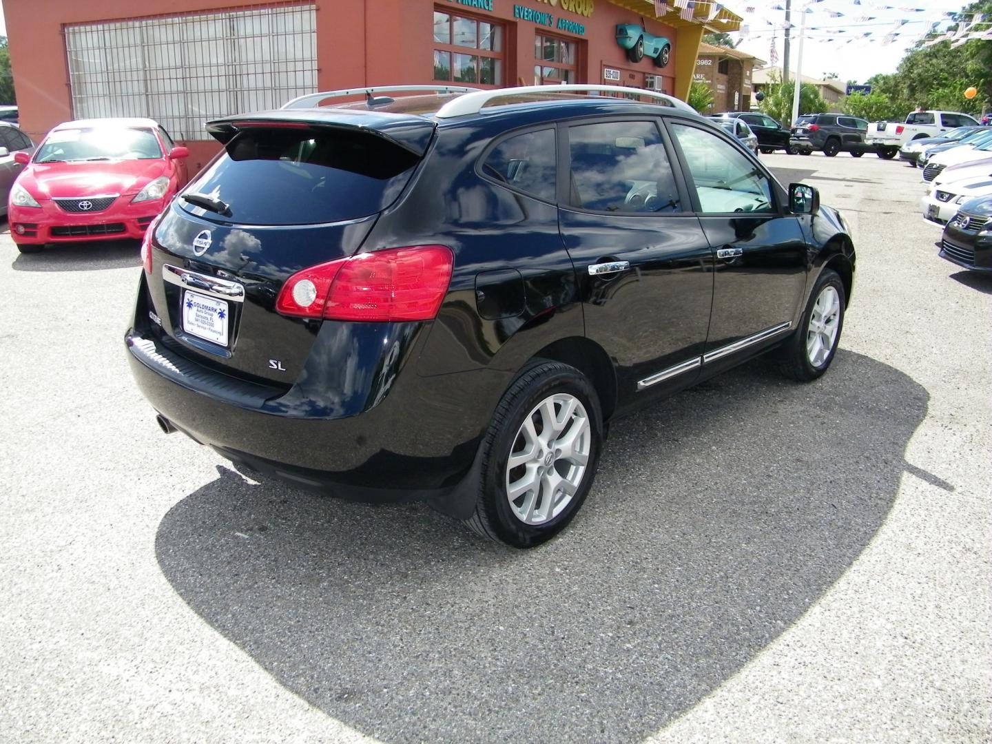 2012 Black /Tan Nissan Rogue S FWD Krom Edition (JN8AS5MT2CW) with an 2.5L L4 DOHC 16V engine, Continuously Variable Transmission transmission, located at 4000 Bee Ridge Road, Sarasota, FL, 34233, (941) 926-0300, 27.298664, -82.489151 - Photo#5